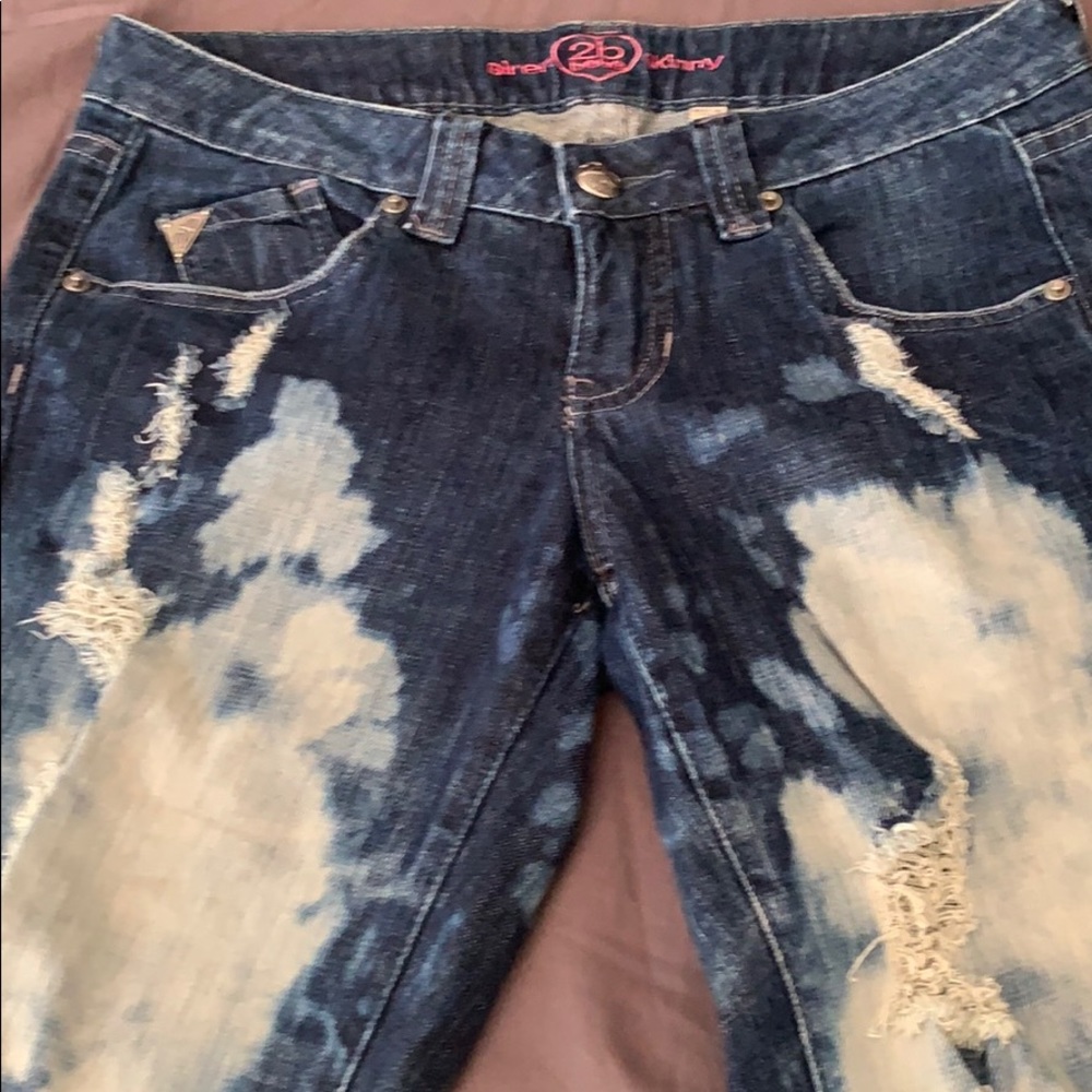 Bebe ripped skinny jeans size 27